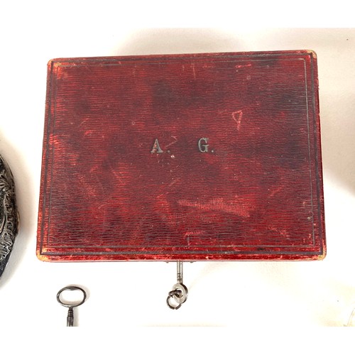 26 - A group of silver and costume jewellery, including a silver backed hand mirror, two Victorian silver... 