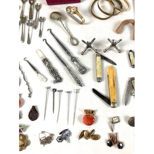 26 - A group of silver and costume jewellery, including a silver backed hand mirror, two Victorian silver... 