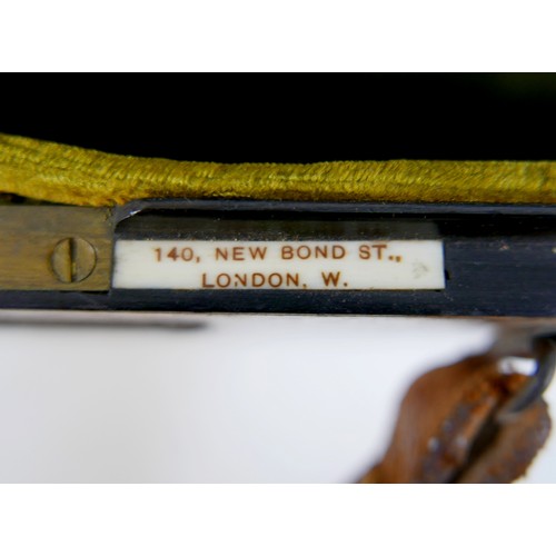 28 - An early / mid 20th century oak violin coffin case, by W. E. Hill & Sons, with fully fitted olive gr... 