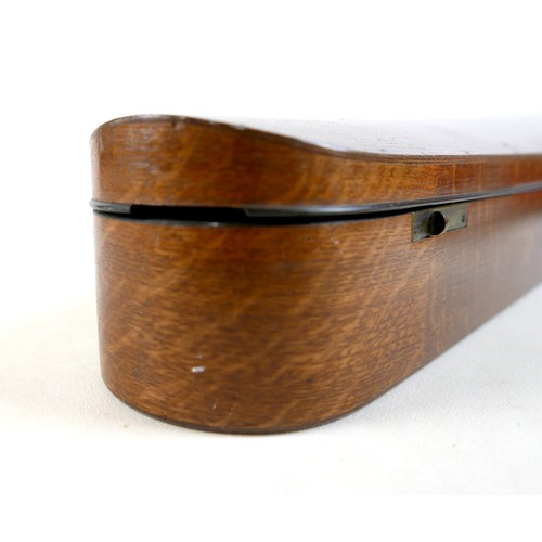 28 - An early / mid 20th century oak violin coffin case, by W. E. Hill & Sons, with fully fitted olive gr... 