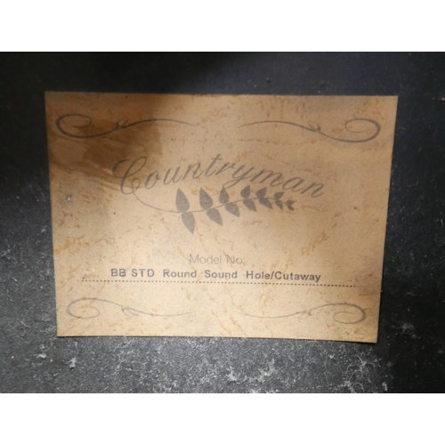 42 - A Countryman electro-acoustic guitar, with battery powered pre-amp and an unbranded guitar cable. (2... 