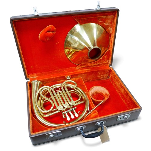 57 - An H. Singhai, French horn with fitted case.