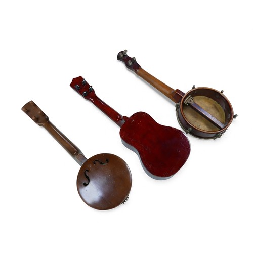 38 - Three ukuleles, including a Hawaiian Leolani and two banjo ukuleles, a/f, all without cases.  (3)