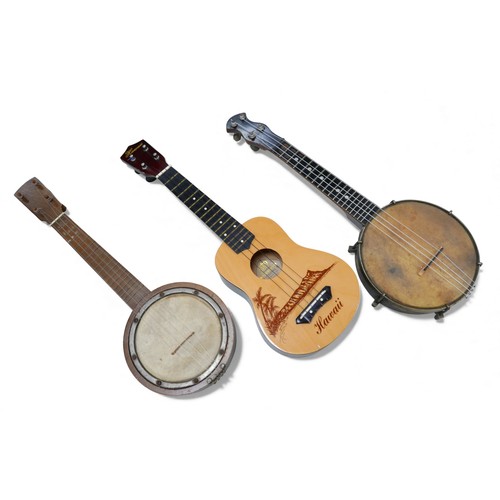 38 - Three ukuleles, including a Hawaiian Leolani and two banjo ukuleles, a/f, all without cases.  (3)