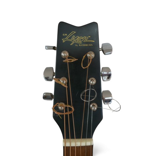 40 - A Washburn G. W. Lyon LD 7M, six string acoustic guitar.