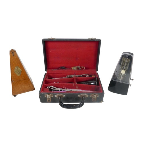 50 - An Embassy Beason clarinet and two metronomes.(3)