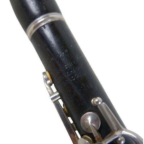 50 - An Embassy Beason clarinet and two metronomes.(3)