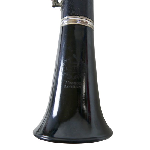 50 - An Embassy Beason clarinet and two metronomes.(3)