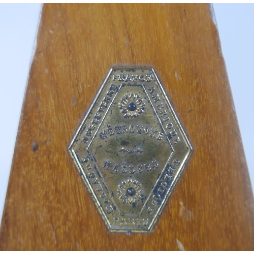 50 - An Embassy Beason clarinet and two metronomes.(3)