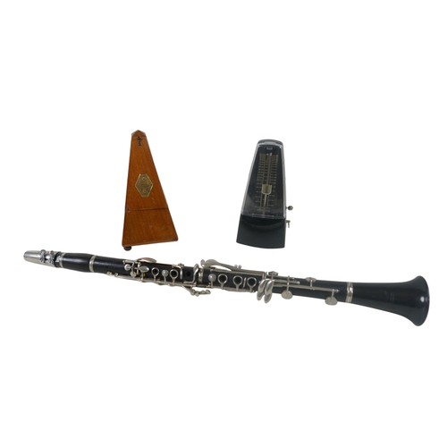 50 - An Embassy Beason clarinet and two metronomes.(3)