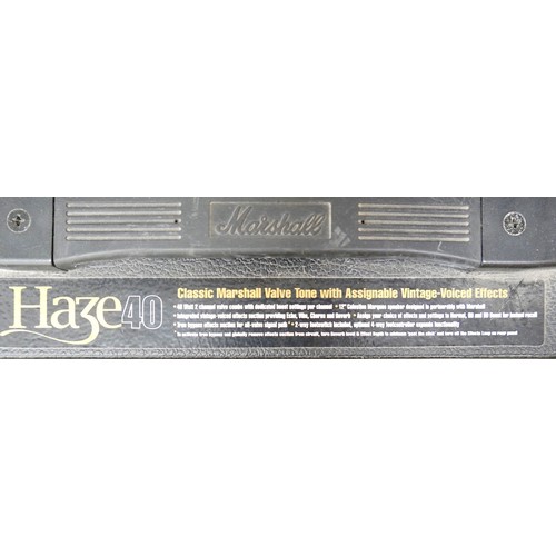 43 - A Marshall 40W Haze amplifier and foot pedal. (2)