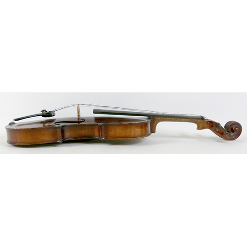 21 - An early / mid 20th century Continental violin, with an indistinct label, 14 inch two piece back. 
P... 