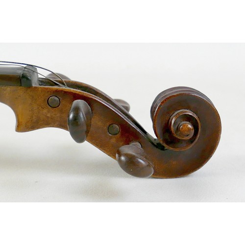 21 - An early / mid 20th century Continental violin, with an indistinct label, 14 inch two piece back. 
P... 