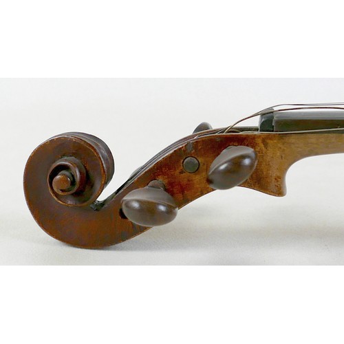 21 - An early / mid 20th century Continental violin, with an indistinct label, 14 inch two piece back. 
P... 