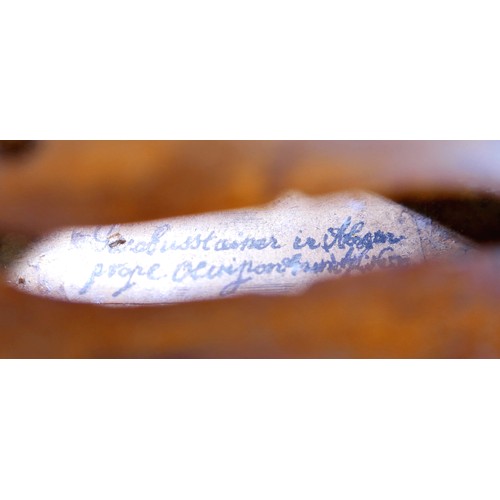 15 - A 19th century violin, bearing a hand written label Jacobus Stainer in Absam prope Oenipontum fecit ... 