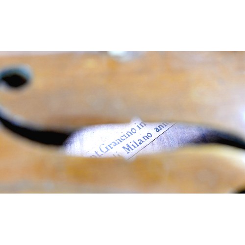 12 - A 19th century Continental violin, bearing label 'Gia Bart. Grancino in Contrada Largha di Milano an... 
