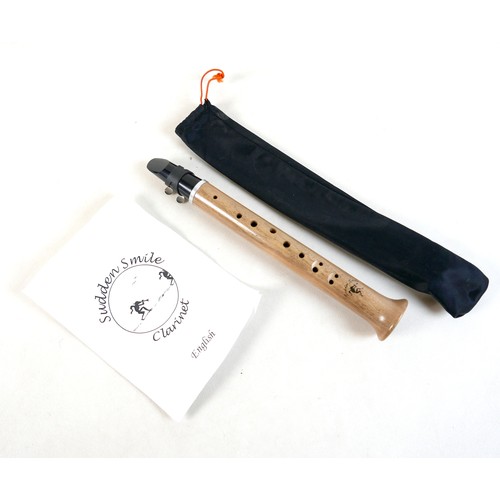 45 - A Sudden Smile clarinet, 32cm long, with soft case and instructions.