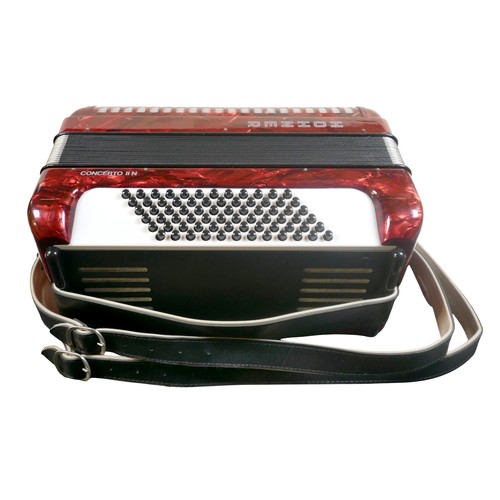 62 - A Hohner accordion, in red marbled finish.