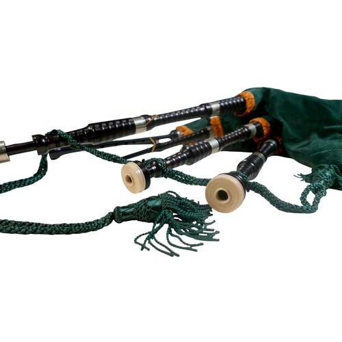 64 - A set of bagpipes, with green fabric and ebonised pipes, inscribed maker's name 'Inveran' to one pip... 