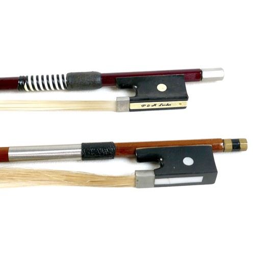 22 - A late 20th century Romanian violin, by Andreas Feller, with two bows and in a black fitted hard cas... 