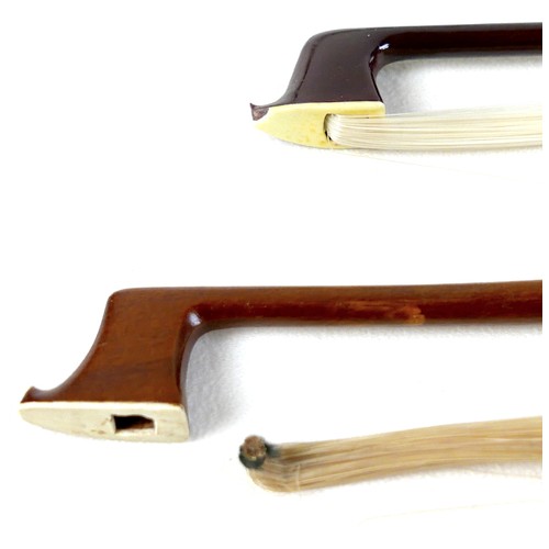 22 - A late 20th century Romanian violin, by Andreas Feller, with two bows and in a black fitted hard cas... 