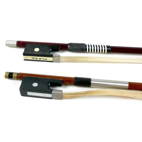 22 - A late 20th century Romanian violin, by Andreas Feller, with two bows and in a black fitted hard cas... 