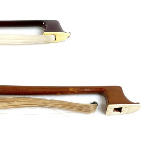 22 - A late 20th century Romanian violin, by Andreas Feller, with two bows and in a black fitted hard cas... 