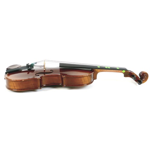 23 - A late 20th century German 1/4 size violin, by Herman, model Q017A, with bow and soft case, back 11