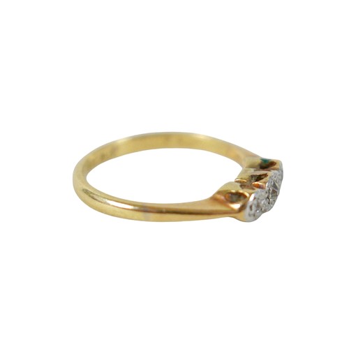 32 - An 18ct yellow gold and platinum three stone diamond ring, illusion set, size K, 2.2g.