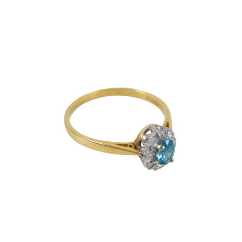 53 - An 18ct yellow gold pale sapphire and diamond cluster ring size W, head size 10 by 8mm, 4.0g.