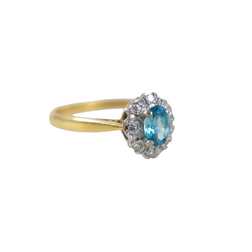 53 - An 18ct yellow gold pale sapphire and diamond cluster ring size W, head size 10 by 8mm, 4.0g.