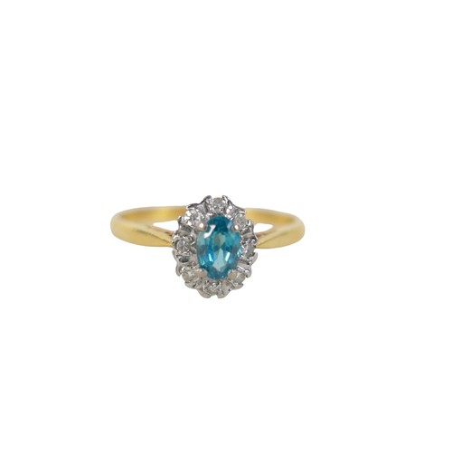 53 - An 18ct yellow gold pale sapphire and diamond cluster ring size W, head size 10 by 8mm, 4.0g.