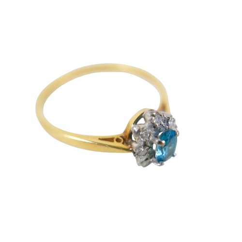 53 - An 18ct yellow gold pale sapphire and diamond cluster ring size W, head size 10 by 8mm, 4.0g.