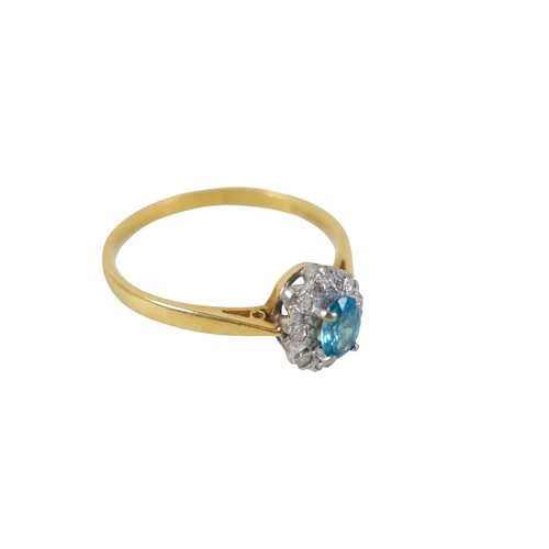 53 - An 18ct yellow gold pale sapphire and diamond cluster ring size W, head size 10 by 8mm, 4.0g.