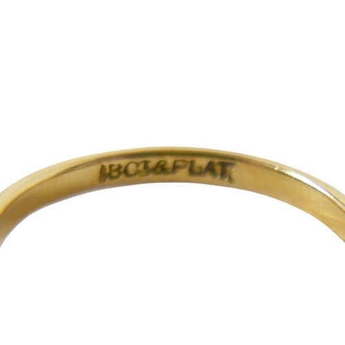 45 - An 18ct yellow gold and platinum three stone diamond crossover ring, illusion set, size N, 3.4g.