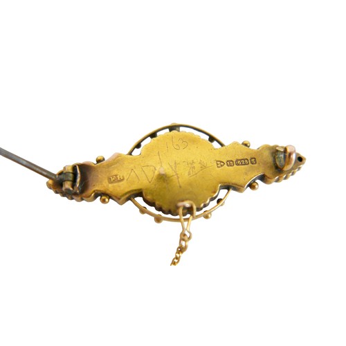 33 - A 9ct yellow gold brooch set with a small seed pearl, having a steel pin, 4.5cm wide, 3.8g.