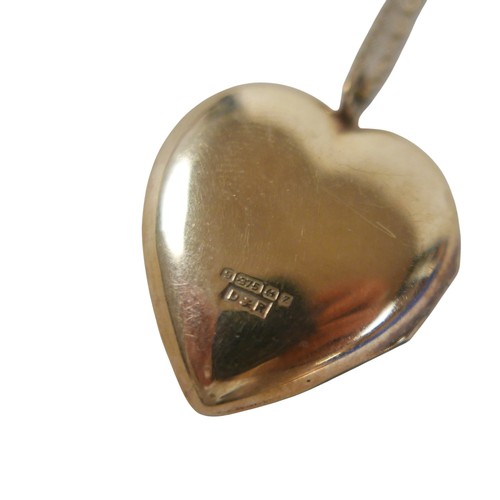 44 - A 9ct yellow gold locket on a 9ct yellow gold chain, chain 48cm long, locket 2cm wide, total weight ... 