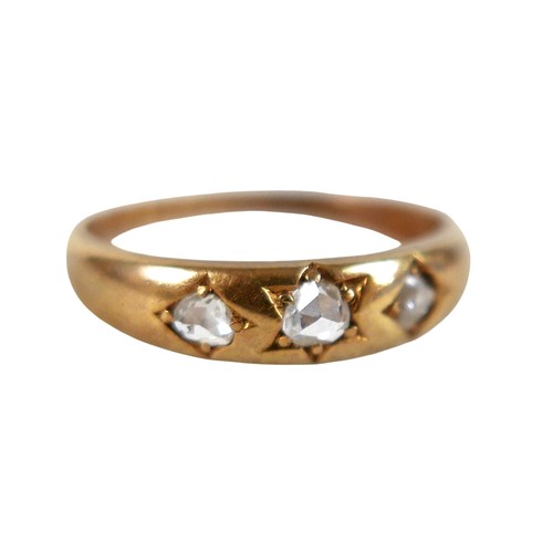 49 - An 18ct yellow gold three stone diamond ring size P, 3.4g.