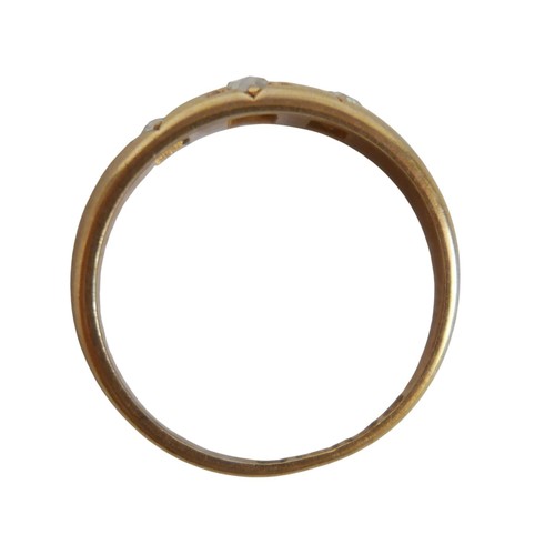 49 - An 18ct yellow gold three stone diamond ring size P, 3.4g.