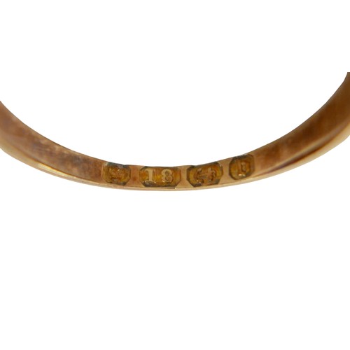 49 - An 18ct yellow gold three stone diamond ring size P, 3.4g.