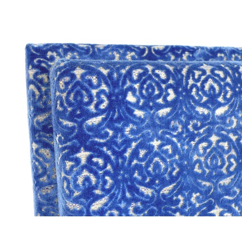 367 - An oversized double headboard, upholstered in blue jacquard fabric, with conforming wooden baton (Fr... 