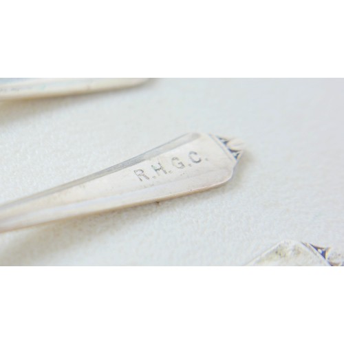 34 - Eighteen assorted silver golf novelty teaspoons, comprising 4 with cross clubs maker PB Sheffield 19... 