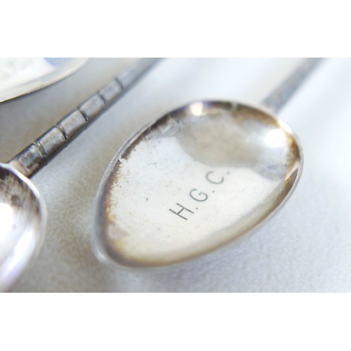 34 - Eighteen assorted silver golf novelty teaspoons, comprising 4 with cross clubs maker PB Sheffield 19... 