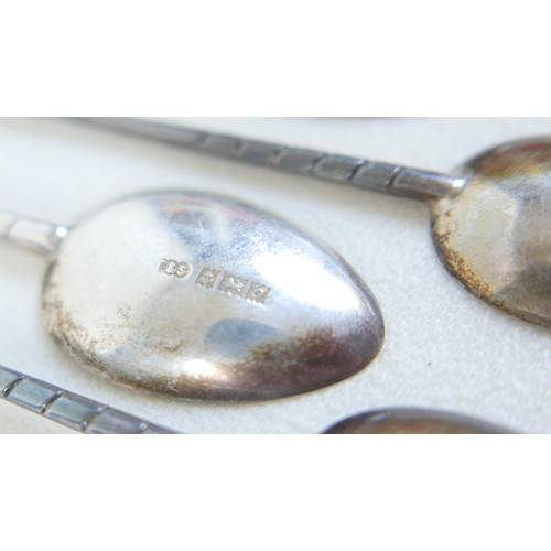 34 - Eighteen assorted silver golf novelty teaspoons, comprising 4 with cross clubs maker PB Sheffield 19... 