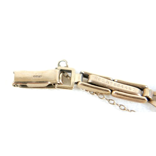 59 - A 9ct gold cased lady's Oriosa wristwatch, with gold strap, square dial, 14.1g.