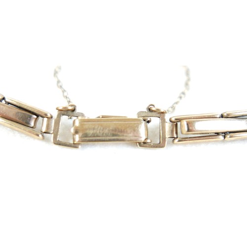 59 - A 9ct gold cased lady's Oriosa wristwatch, with gold strap, square dial, 14.1g.