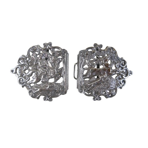 8 - A silver plated nurses belt buckle decorated with a hunt scene, a silver plated belt, 67cm long, a L... 