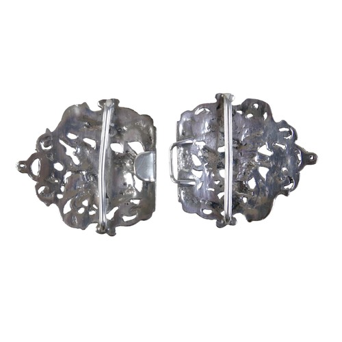 8 - A silver plated nurses belt buckle decorated with a hunt scene, a silver plated belt, 67cm long, a L... 