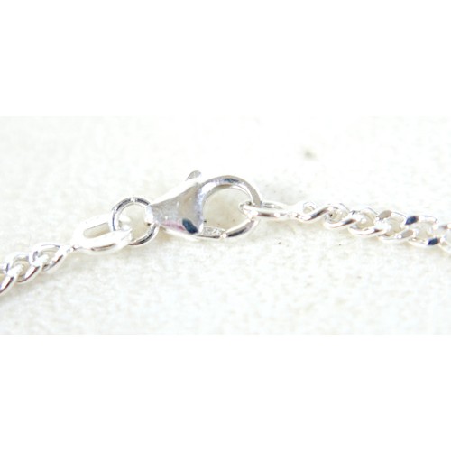 19 - Four pieces of silver/white metal jewellery and a rolled gold bangle, including a pearl ring, size R... 