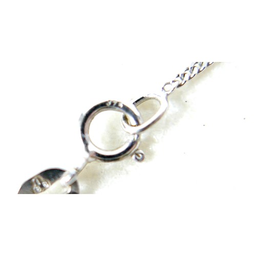 42 - A 9ct white gold diamond set crucifix on a fine 9ct chain 12 by 10 by 5mm, chain 46cm, 3.1g.
